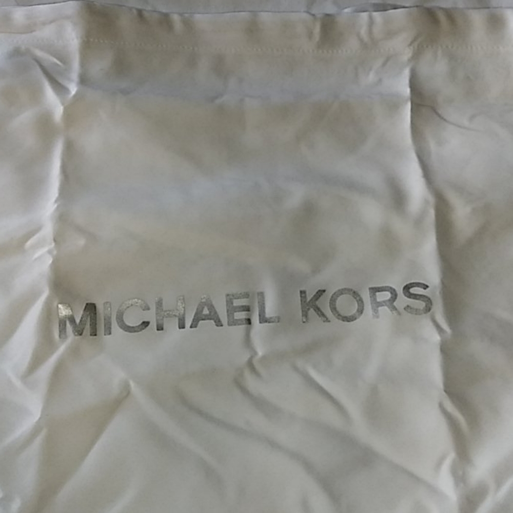 NWOT Michael Kors dust cover 2 listed $15 each.